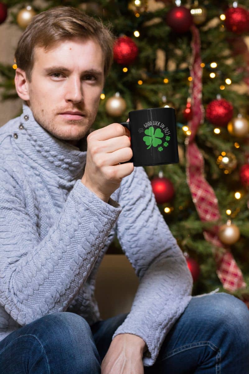 Lucky Charm 11 oz Mug with a guy holding a glass of water next to the tree on Christmas Eve