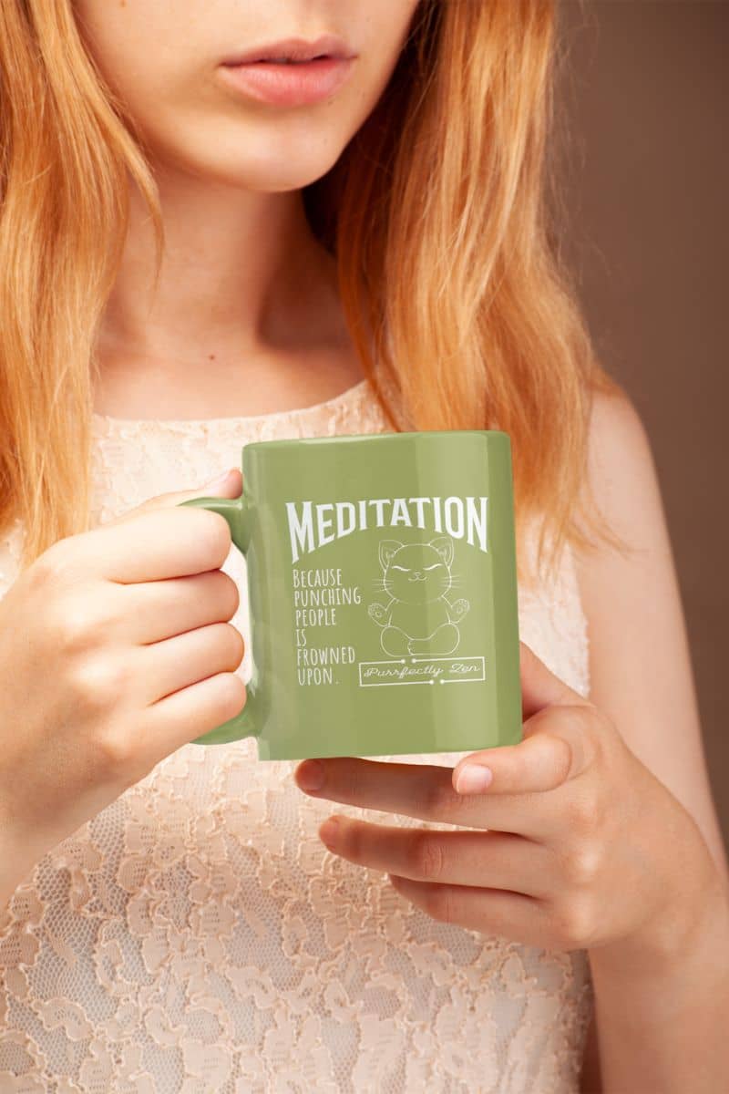 Meditation mug with a girl holding a cup in front of her chest