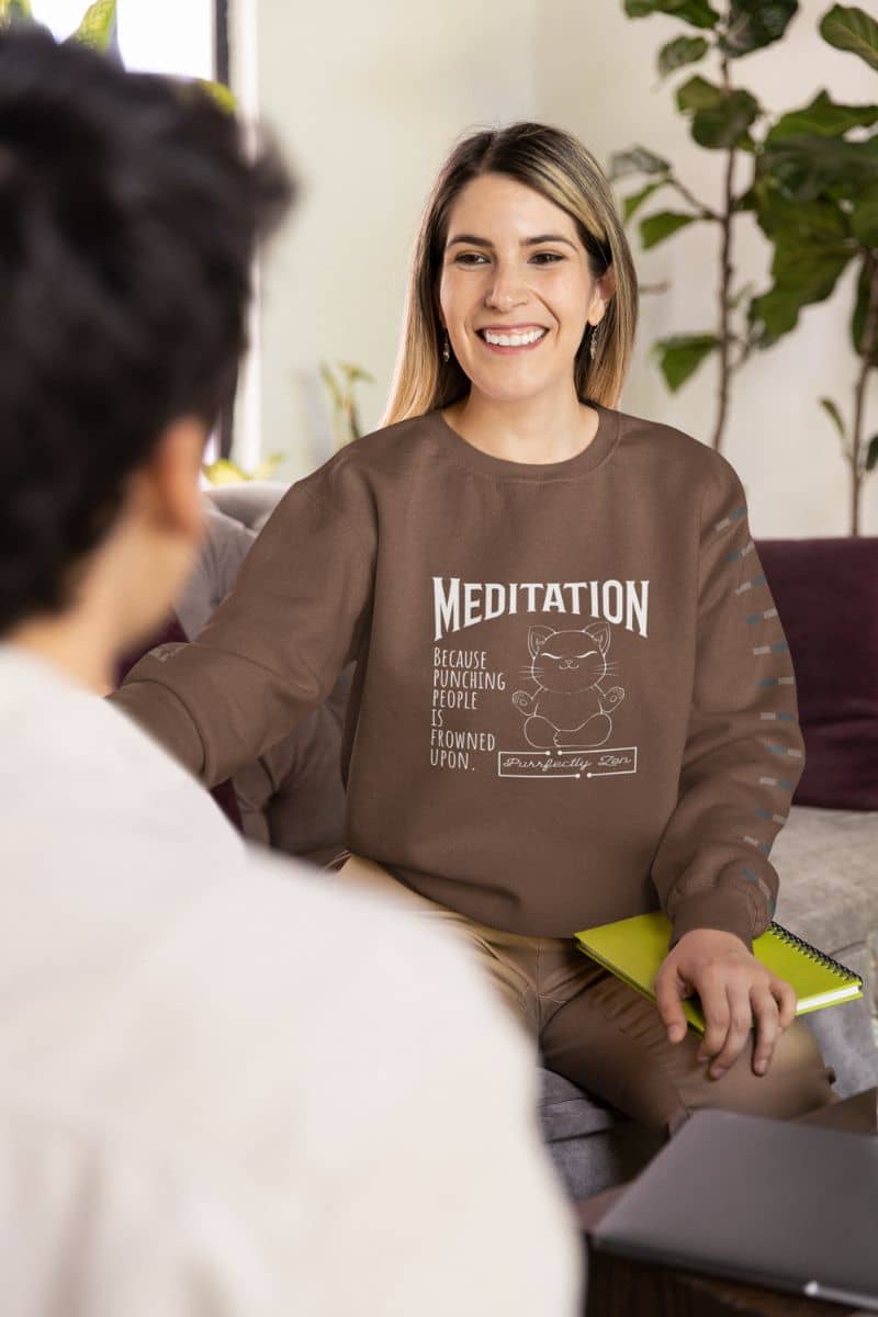 Meditation sweatshirt: Because punching people is frowned upon with a girl discussing with her colleague