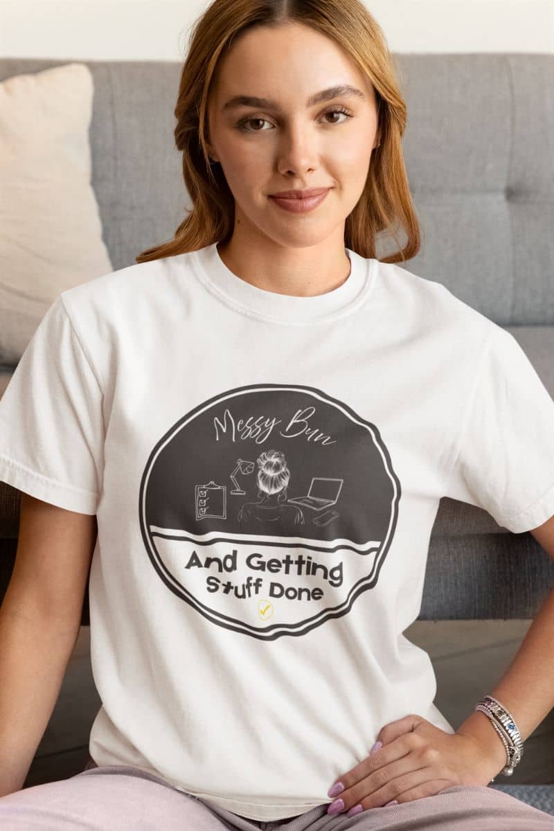 Messy bun t-shirt with a girl sitting posing on sofa