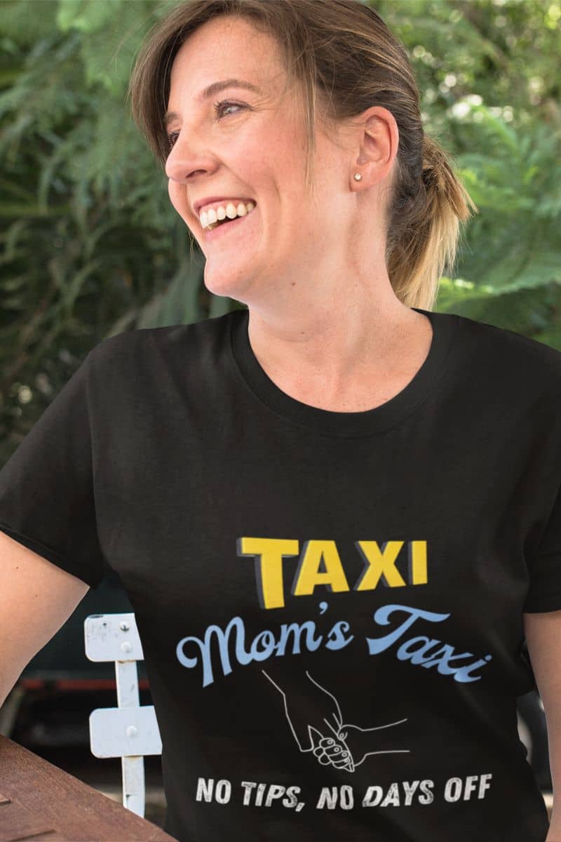 Mom's taxi shirt with a middle-aged woman smiling brightly at the coffee shop