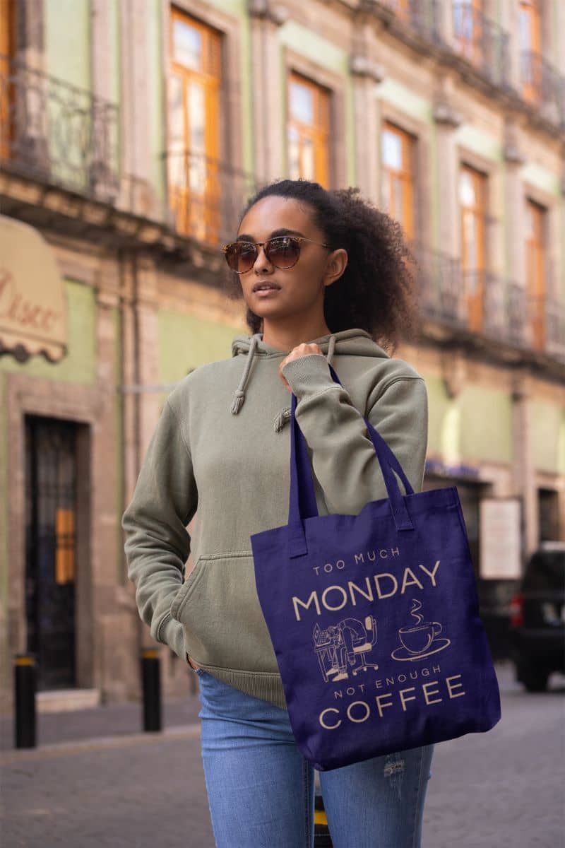 Monday mood tote with a girl carrying a tote bag walking down the street
