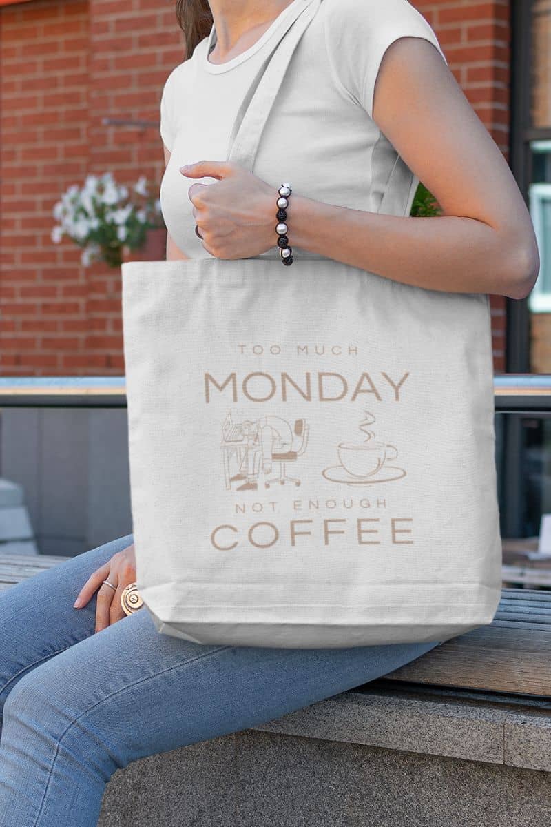 Monday mood tote with a girl sitting on the road railing