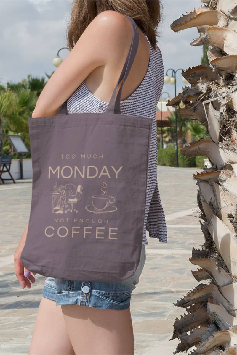 Monday mood tote with the girl standing next to the palm tree