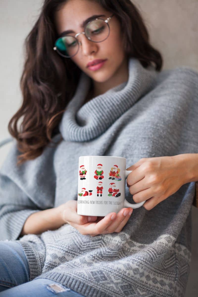 Mug 11 oz Learning New Tricks For The Sleigh with a beautiful girl holding a glass of water and thinking pensively