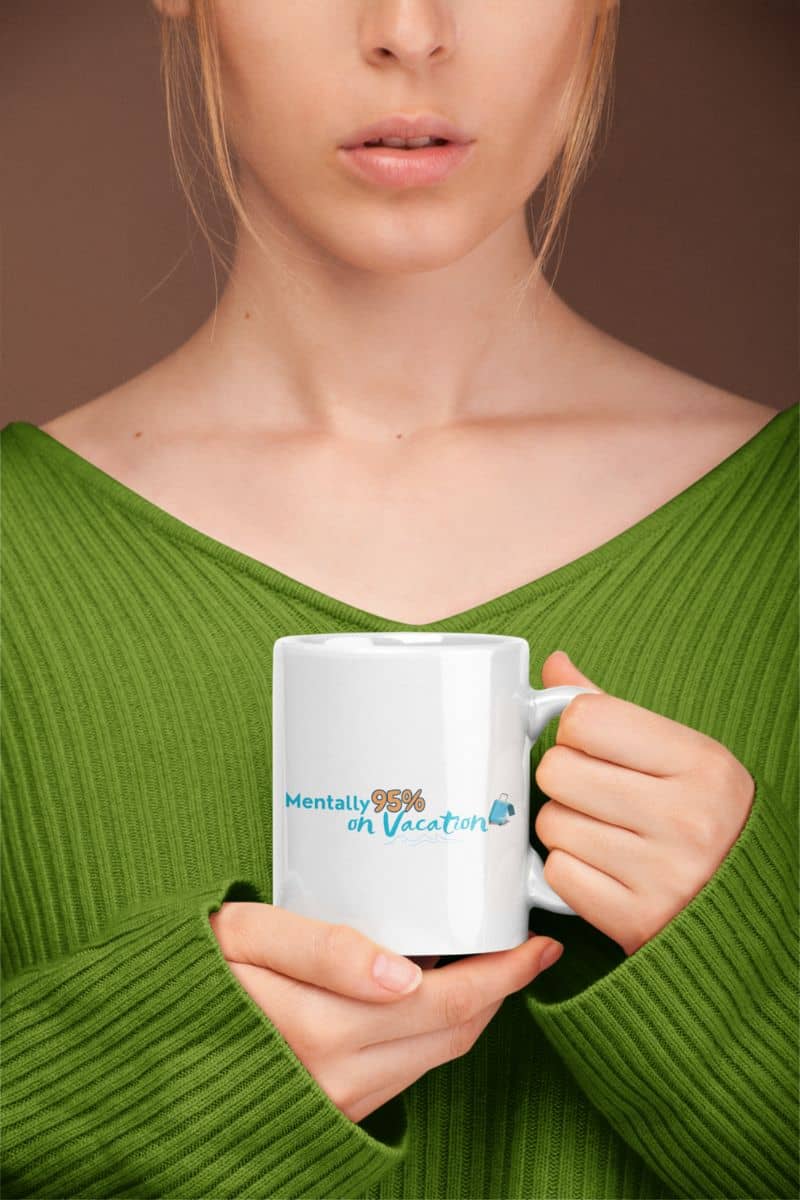 Ocean vibes coffee mug with a person holding a mug with text 'Mentally 90% on Vacation' against a brown background