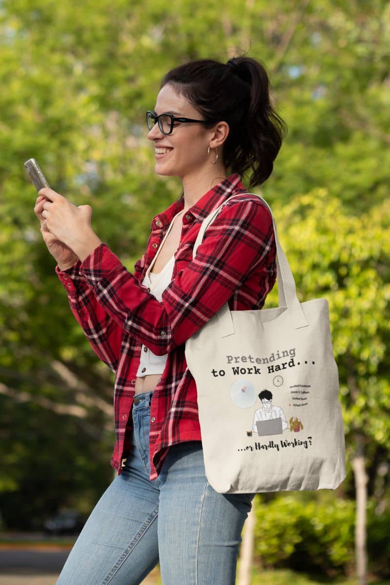 Overthinking tote for coworkers with the girl smiling brightly while looking at her phone