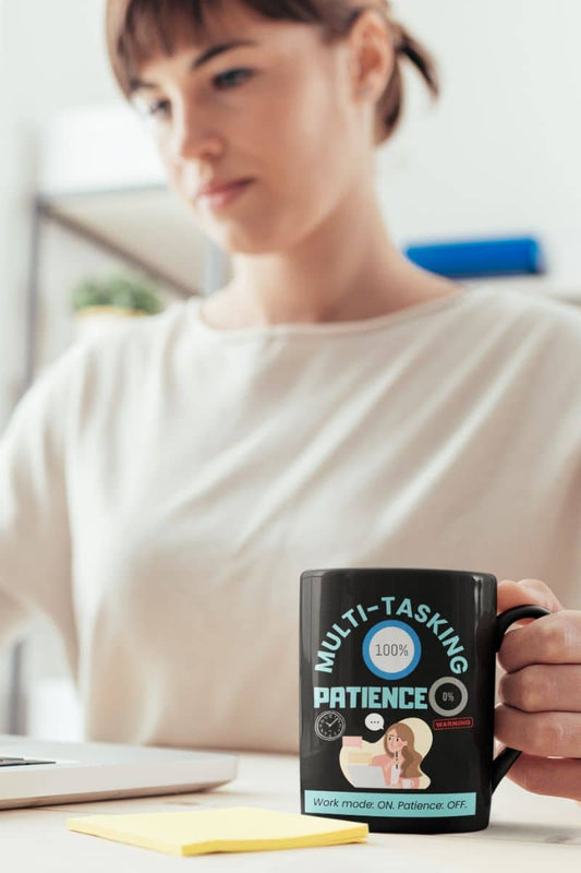 Patience OFF coffee mug with a girl working on a laptop while holding a cup of coffee