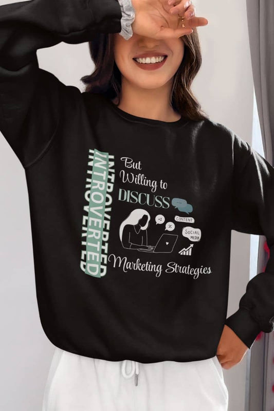 Quiet hustler sweatshirt with a girl covering her eyes with her hands and a bright smile