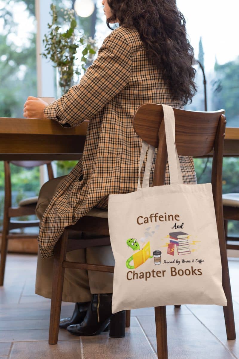 Reading and coffee vibes tote with a girl hanging a tote bag on a chair while sitting in a cafe