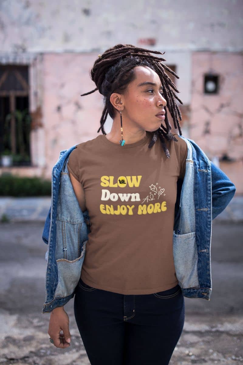 Relaxed fit graphic tee with with a girl posing with her face looking in one direction