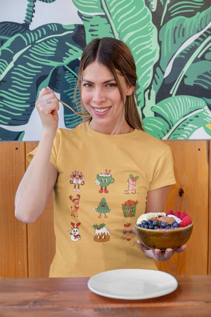 Retro Christmas Cheer - Festive Fun T-Shirt with a girl eating healthy food