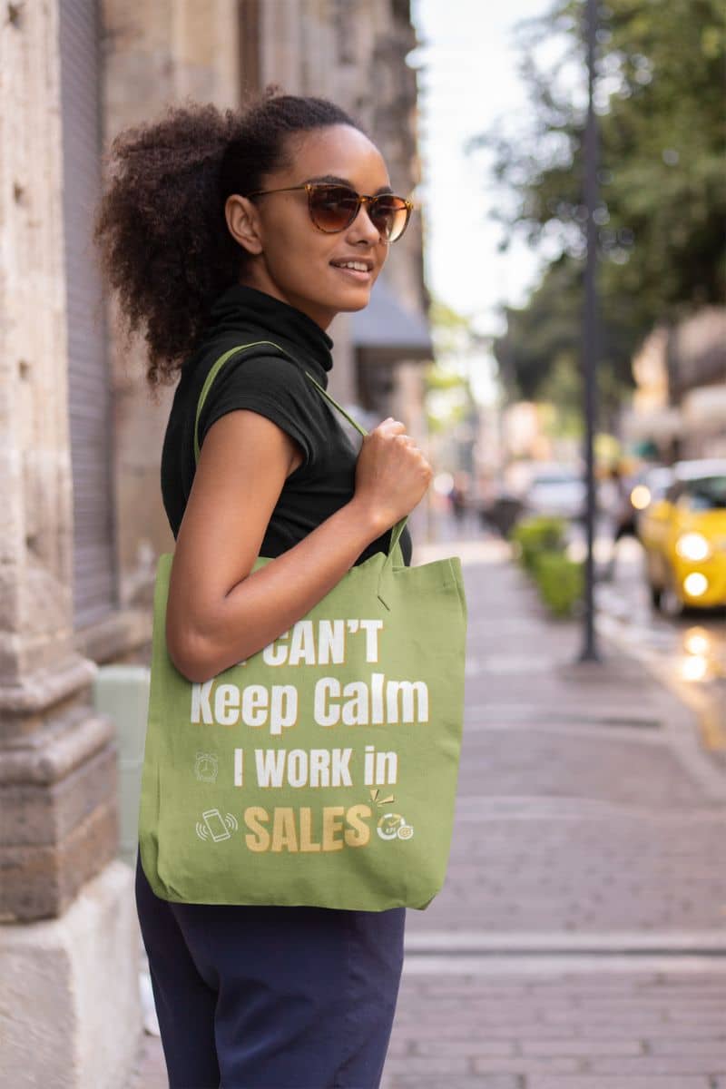 Sales rep tote bag with a girl posing in front of a building