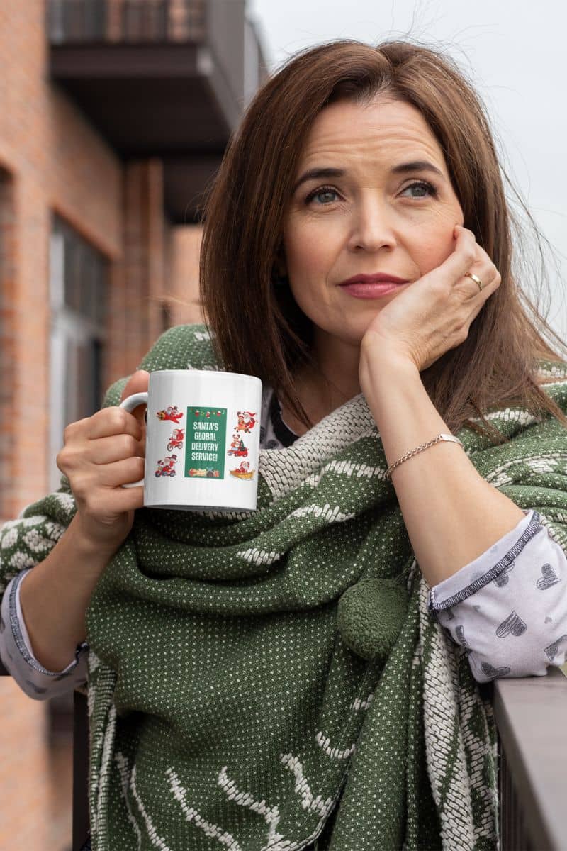 Santas Global Delivery Service Mug with a middle-aged woman resting her chin on her hand and thinking deeply