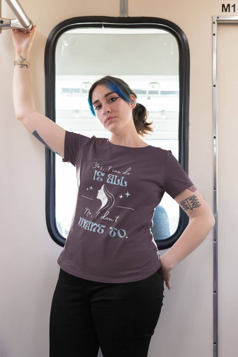 Sarcastic graphic t-shirt with a girl posing while riding a tram