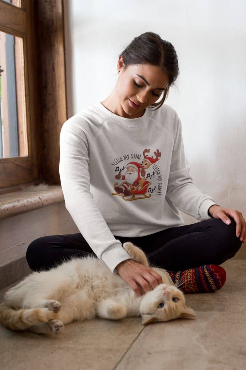 Sleigh my name, Sleigh my name - Cozy winter sweatshirt with the girl playing with her cat
