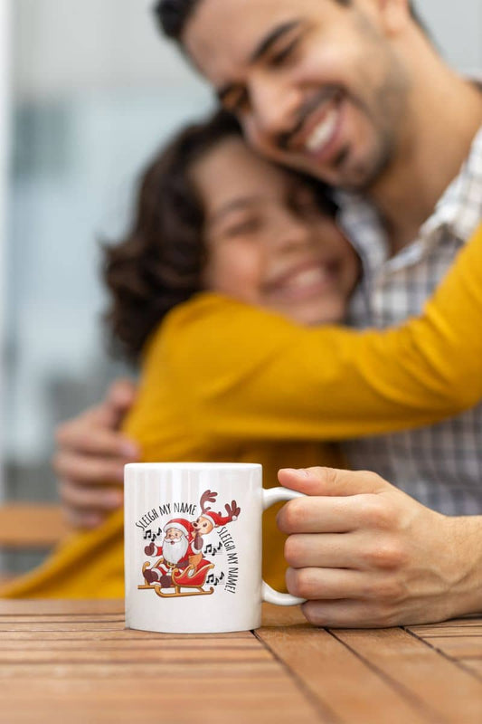 Sleigh my name, sleigh my name - festive christmas mug with a man holding his son and a cup in his hand