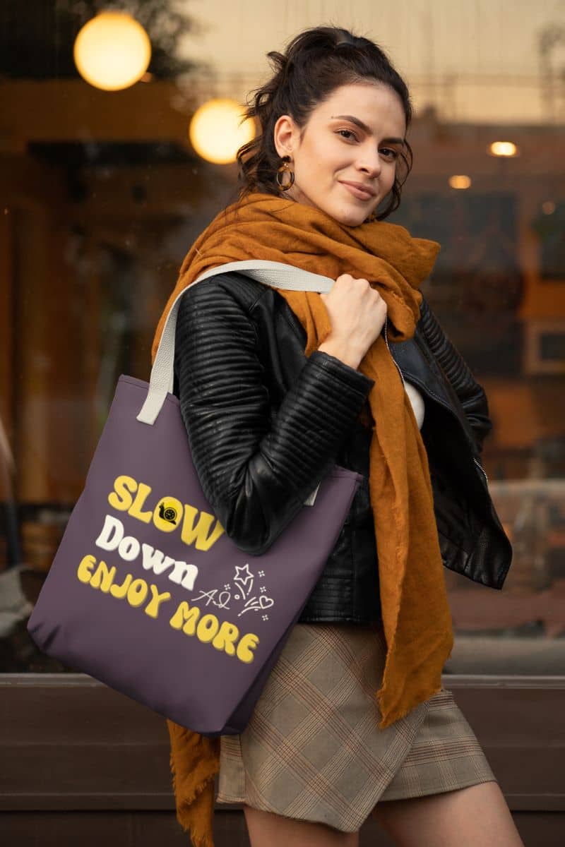 Slow living tote bag with a beautiful girl dressed stylishly walking on the street