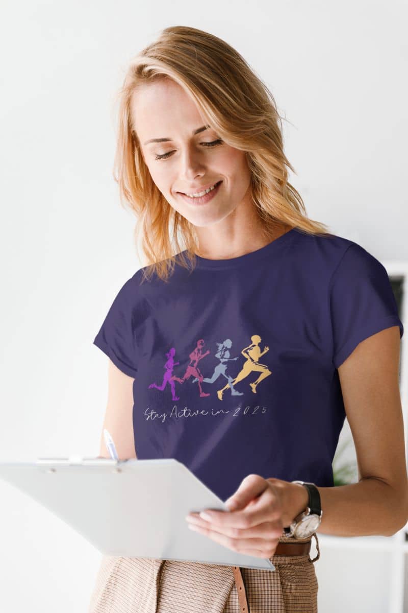 Stay Active in 2025 T-Shirt with a girl checking the work items in the company