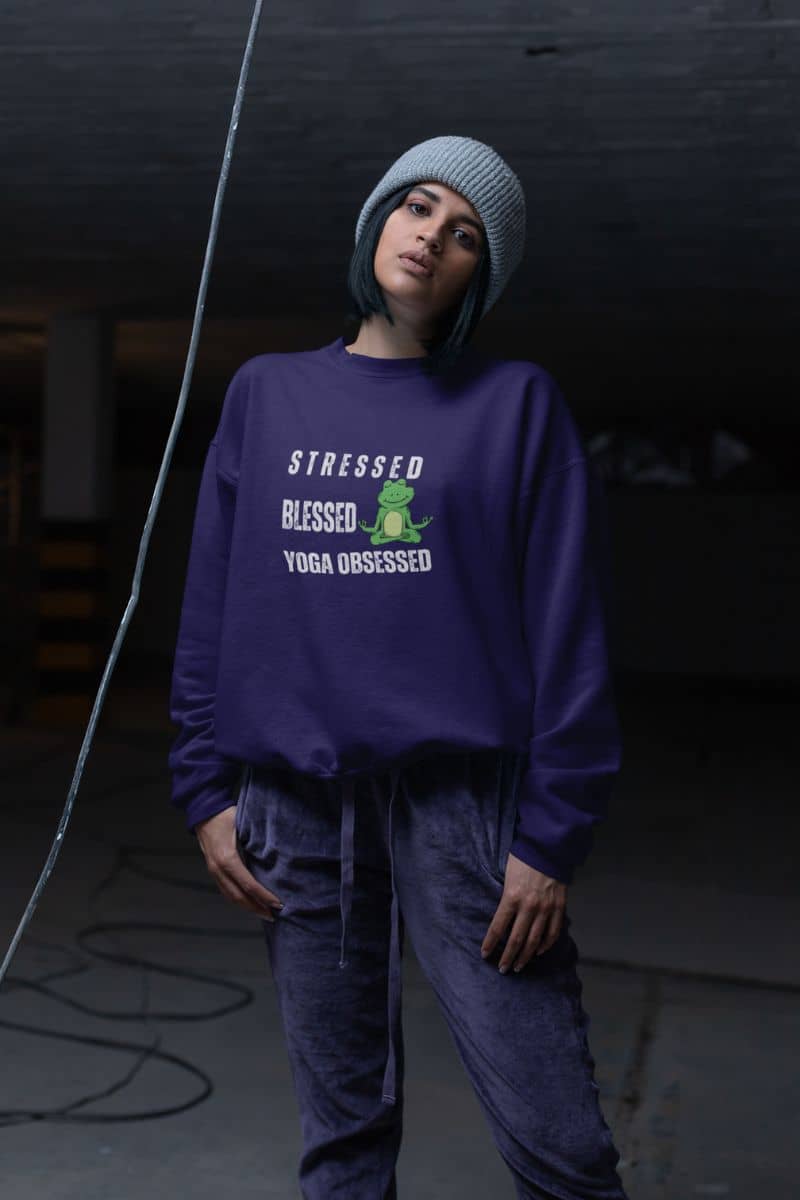Stressed? blessed, yoga obsessed sweatshirt with a girl posing at a construction site