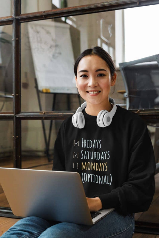 Weekend vibes sweatshirt with the girl sitting working on the wooden floor
