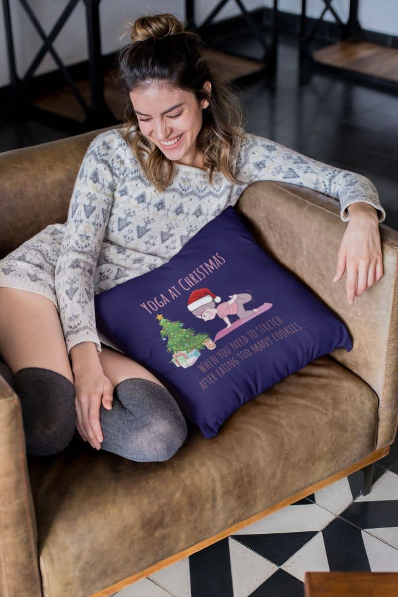 When You Need To Stretch After Eating Too Many Cookies Pillow with a girl sitting on the sofa and laughing happily