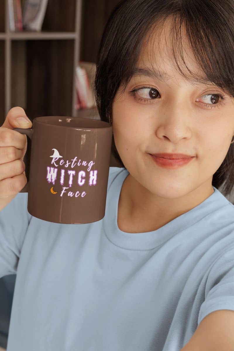 Witchy gift for her with a girl holding a mug with 'Resting Witch Face' text