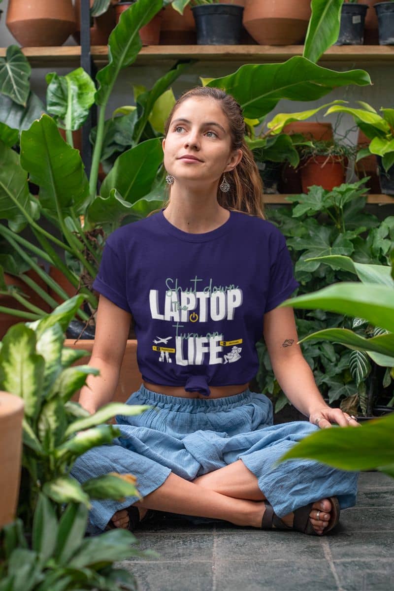 Work-Life balance tee with a girl sitting in the yard next to the flowers in the garden