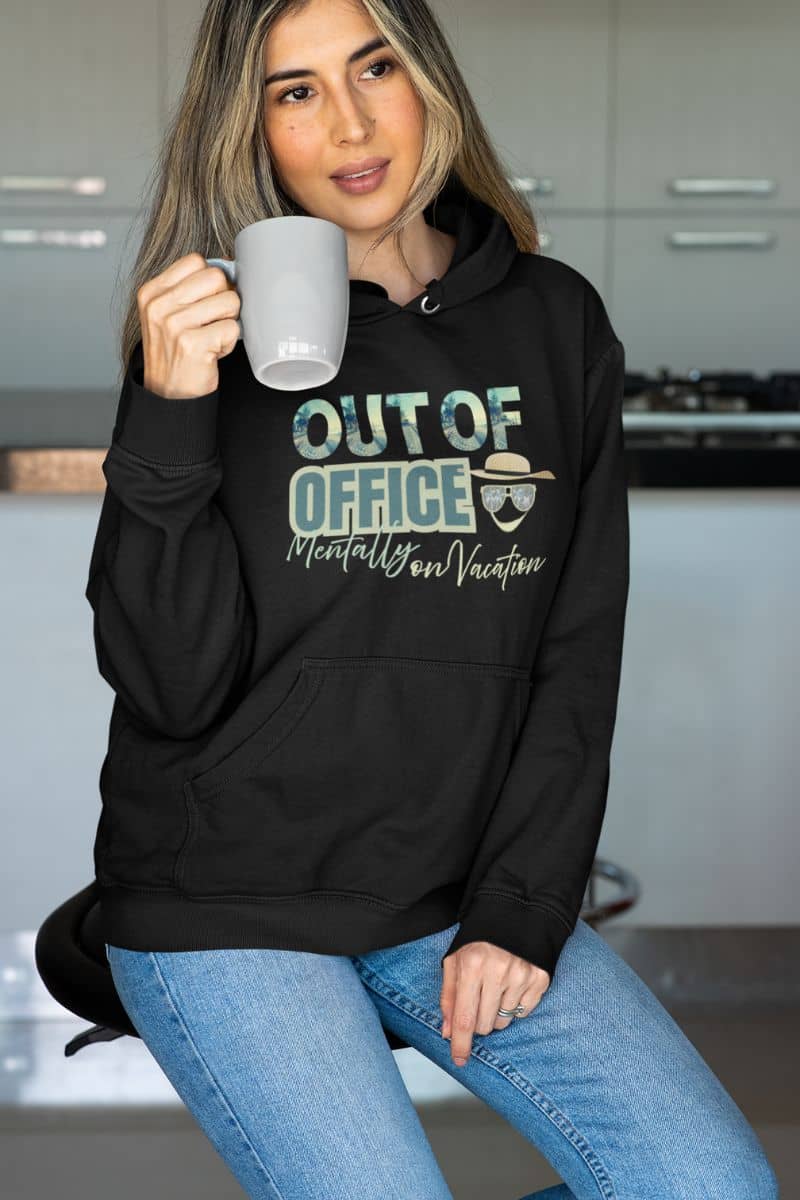 Work from home hoodie with the girl holding the cup and a thoughtful look on her face