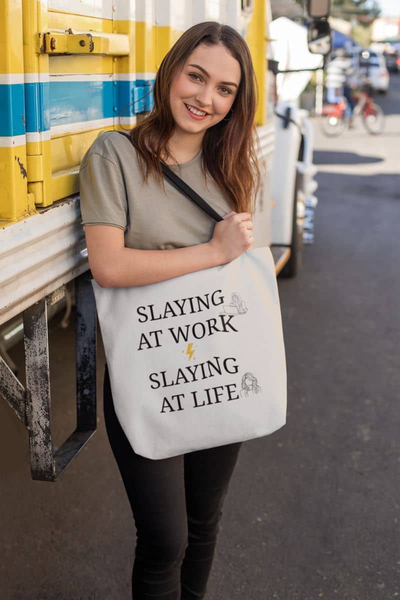 Work life balance tote bag with young girl posing next to old truck