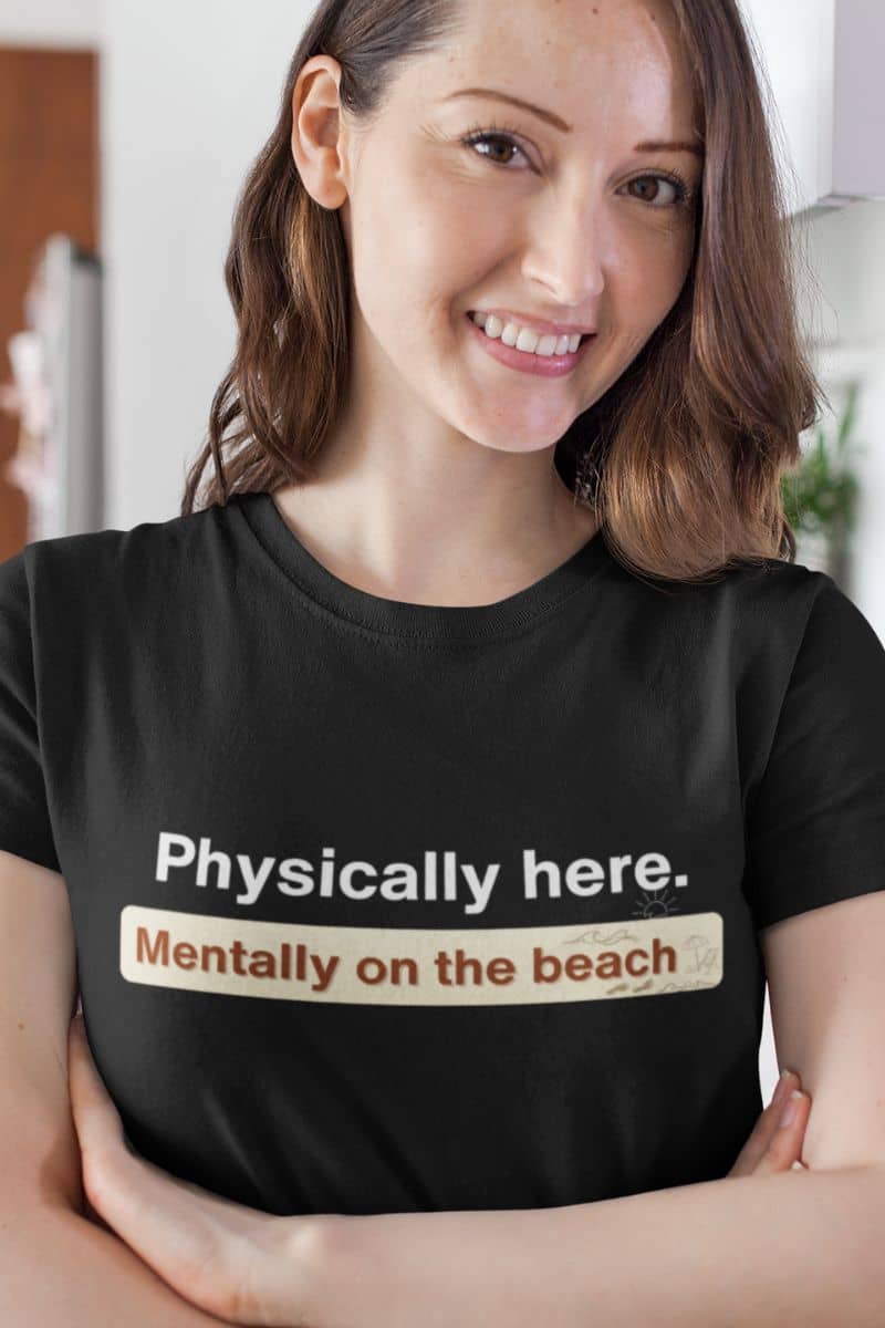 beach lover minimalist tee with a woman wearing a black t-shirt with a humorous message.