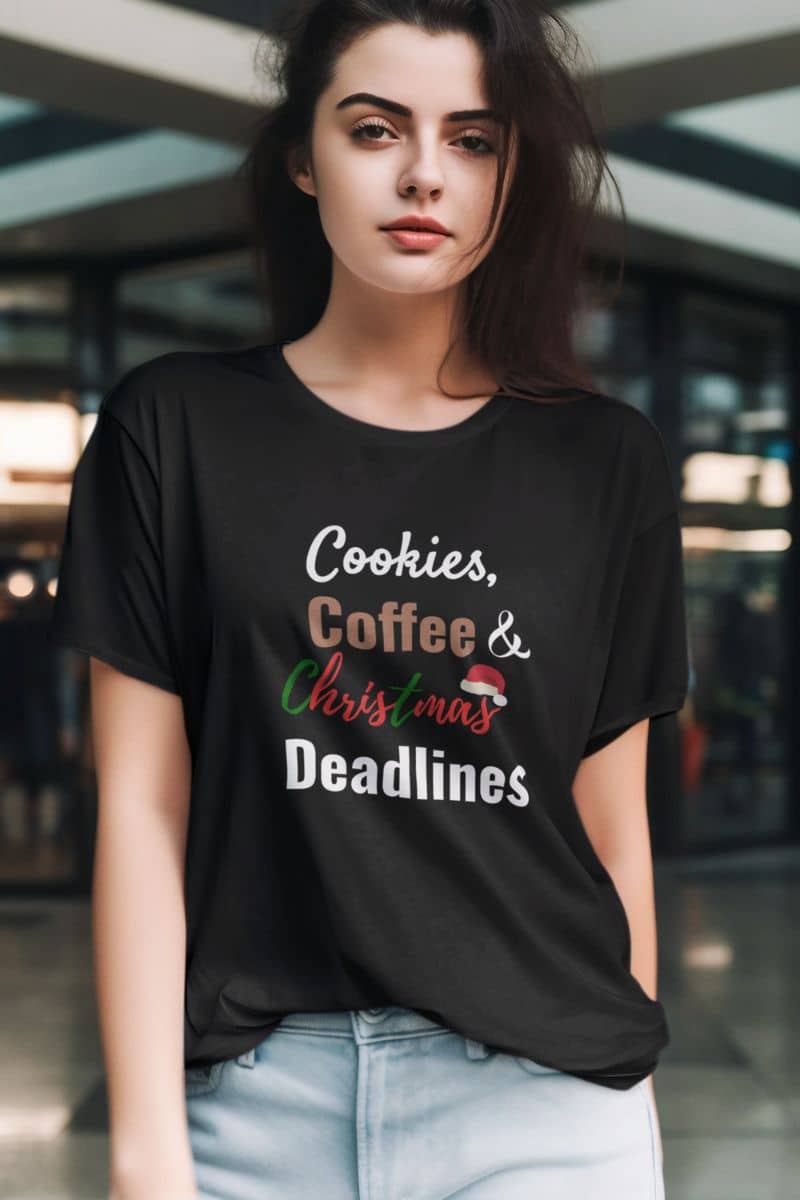 funny holiday t-shirt with a woman wearing a black t-shirt with 'Cookies, Coffee & Christmas Deadlines' text.