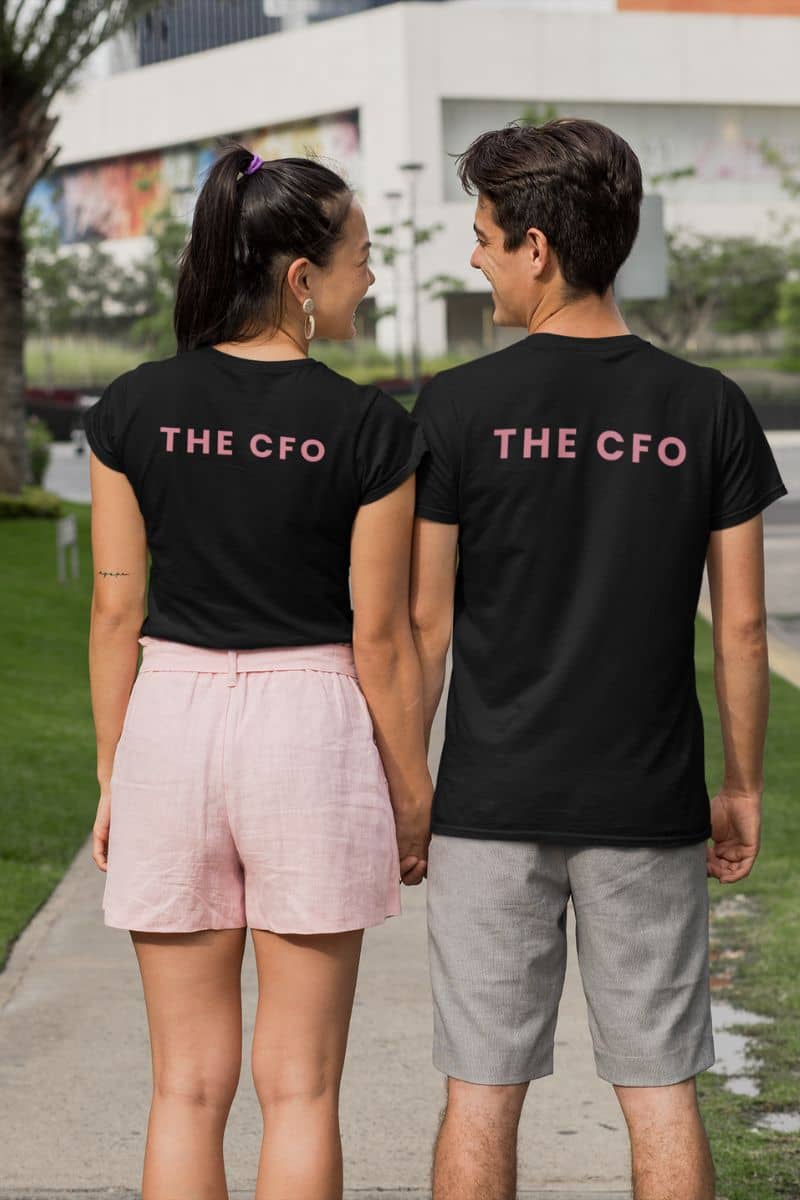 his and hers t-shirts with two people wearing black t-shirts with 'THE CFO' text, standing outdoors.