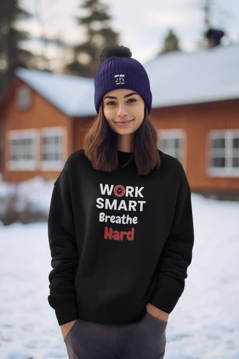 remote work burnout pullover for freelancers with a person wearing a black hoodie with motivational text in a snowy outdoor setting