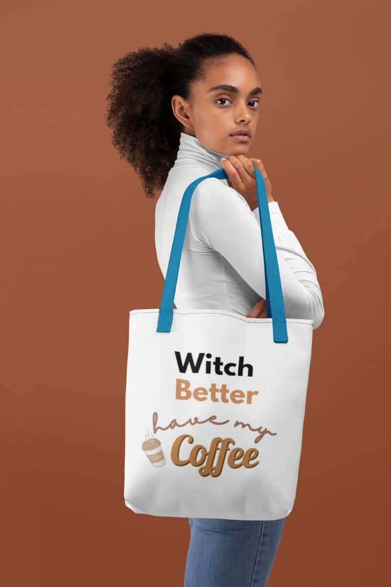 spooky reusable bag with a person holding a tote bag with text against a brown background
