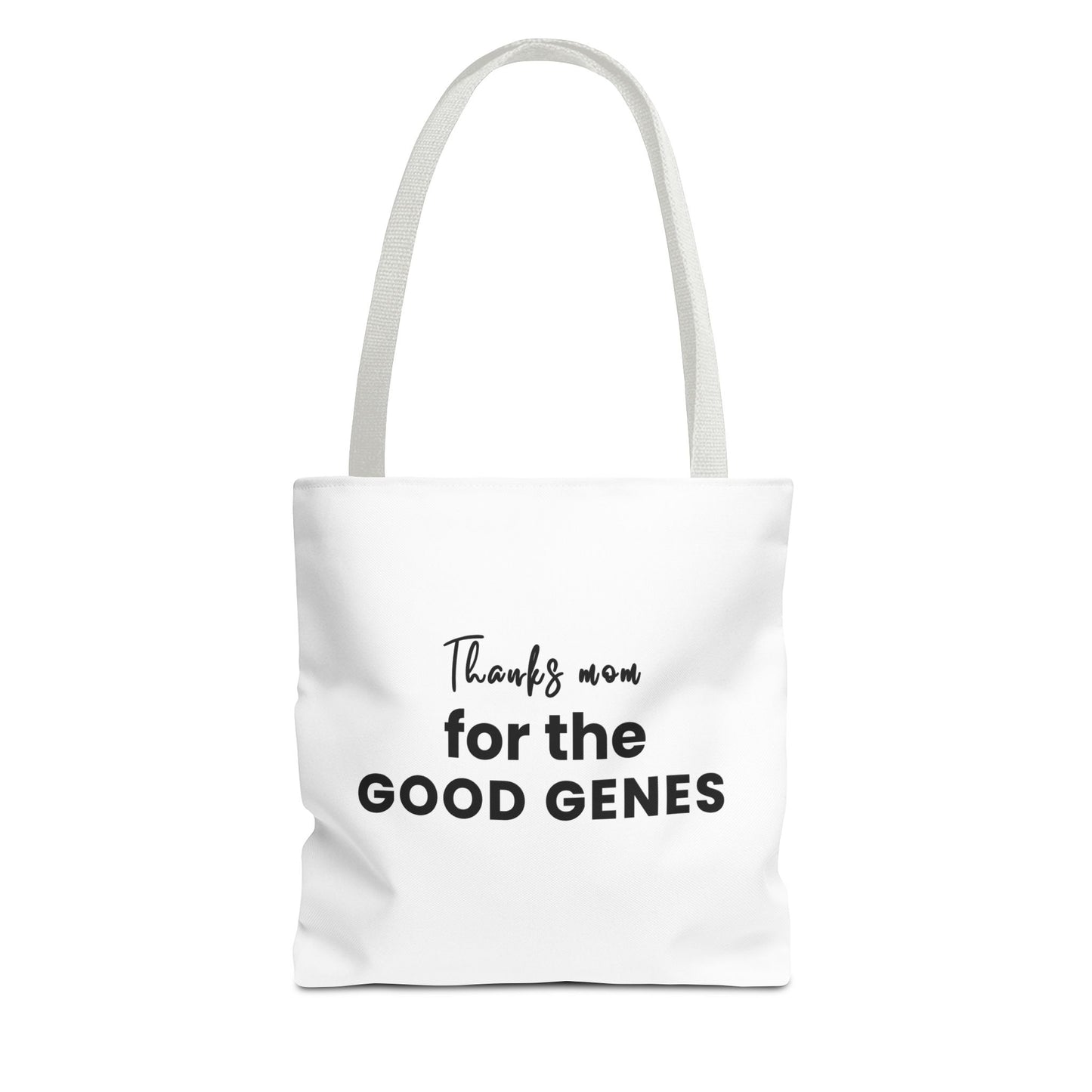 Tote bag with white handles and text 'Thanks Mom for the Good Genes' on a white background