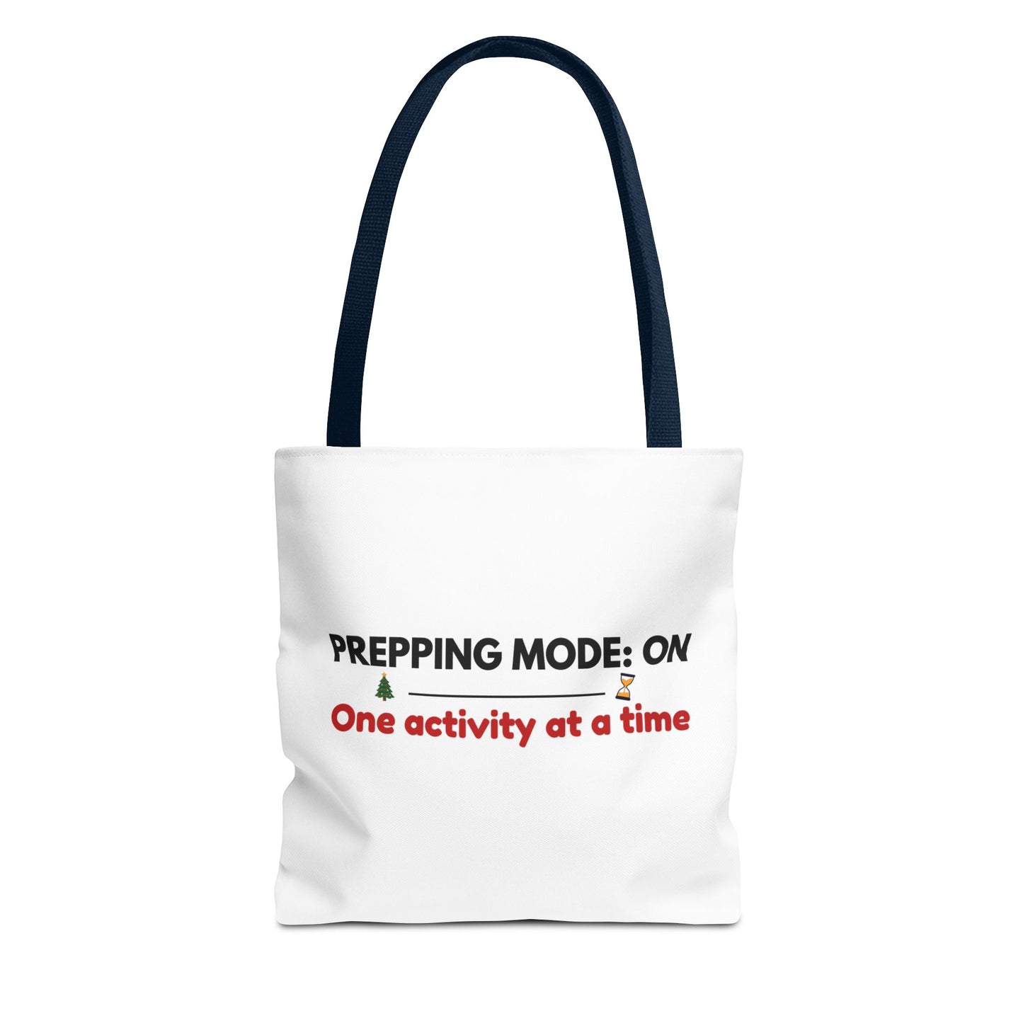Tote bag with navy handle and text 'Prepping Mode: On One Activity at a Time' on a white background