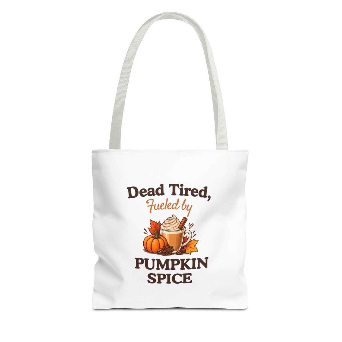 A white canvas tote bag with white shoulder straps, featuring a printed autumn-themed graphic that reads 'Dead Tired, Fueled by Pumpkin Spice'