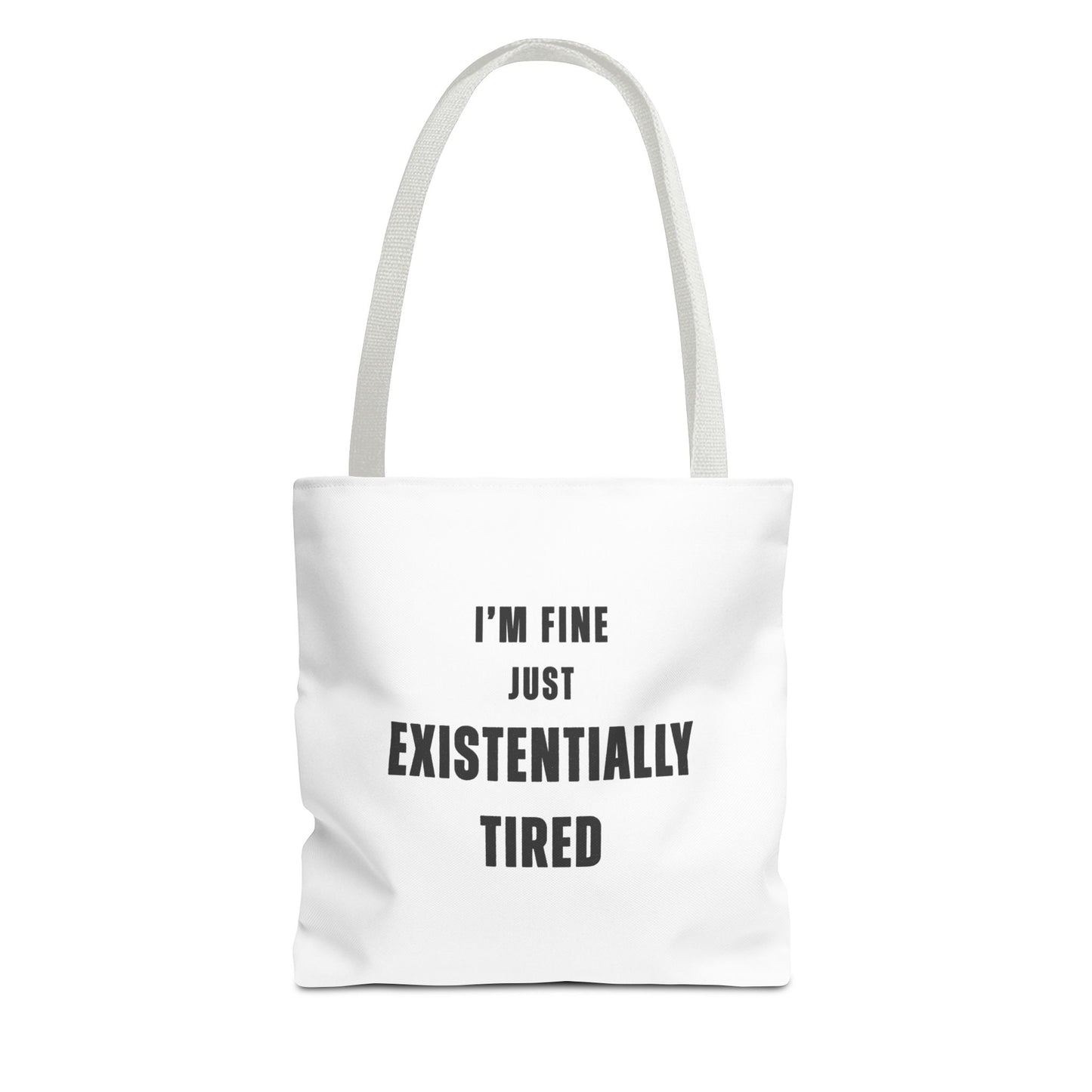 White tote bag with white handles and text 'I’m fine. Just existentially tired.' on a white background