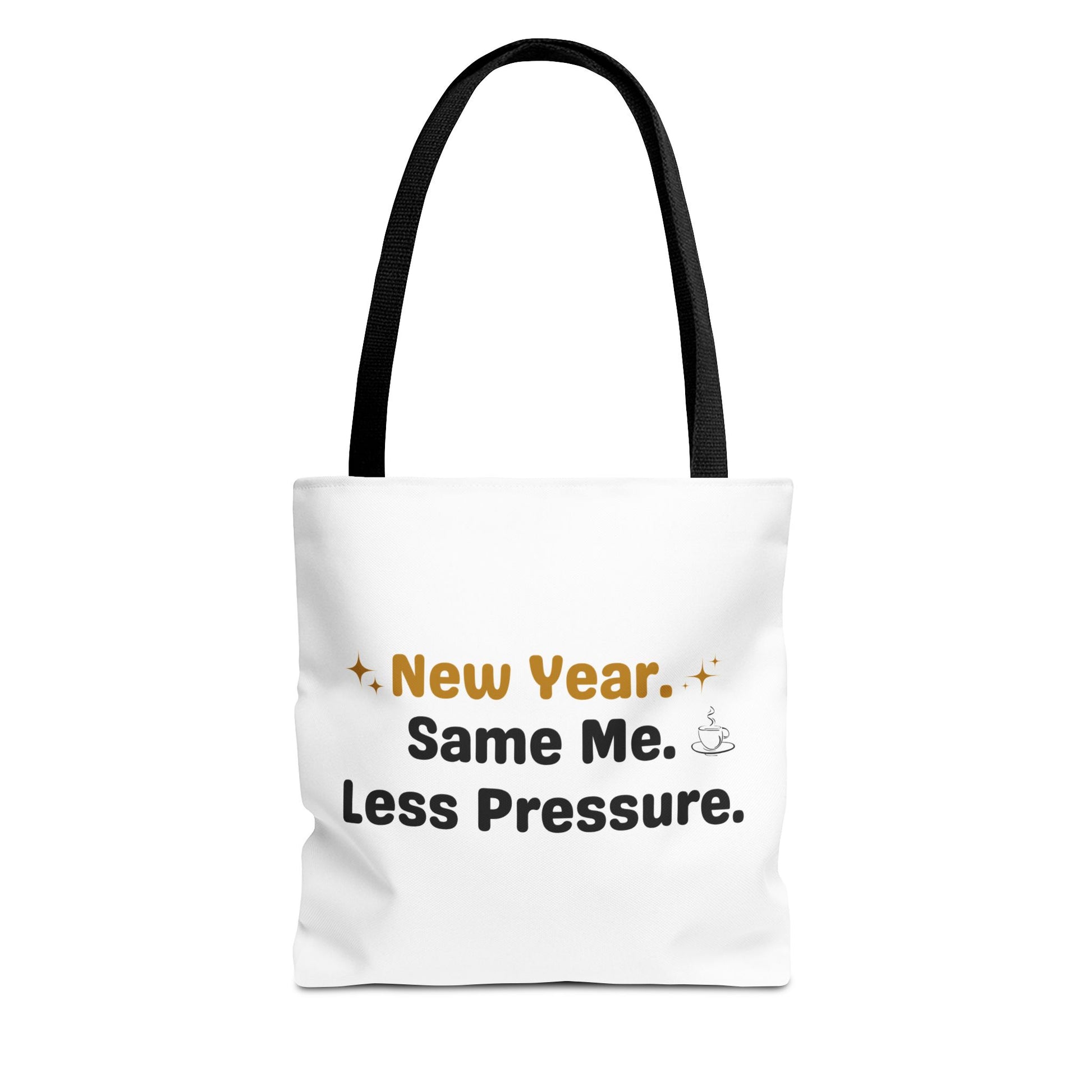 White tote bag with black handle and text 'New Year. Same Me. Less Pressure.' and handle on a white background