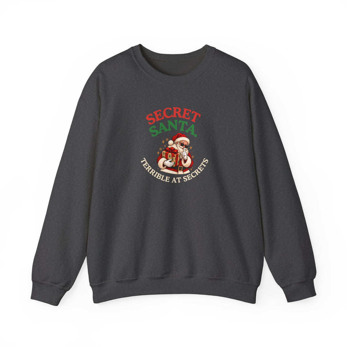 A dark gray sweatshirt featuring the text 'Secret Santa. Terrible at Secrets.' with a Santa illustration