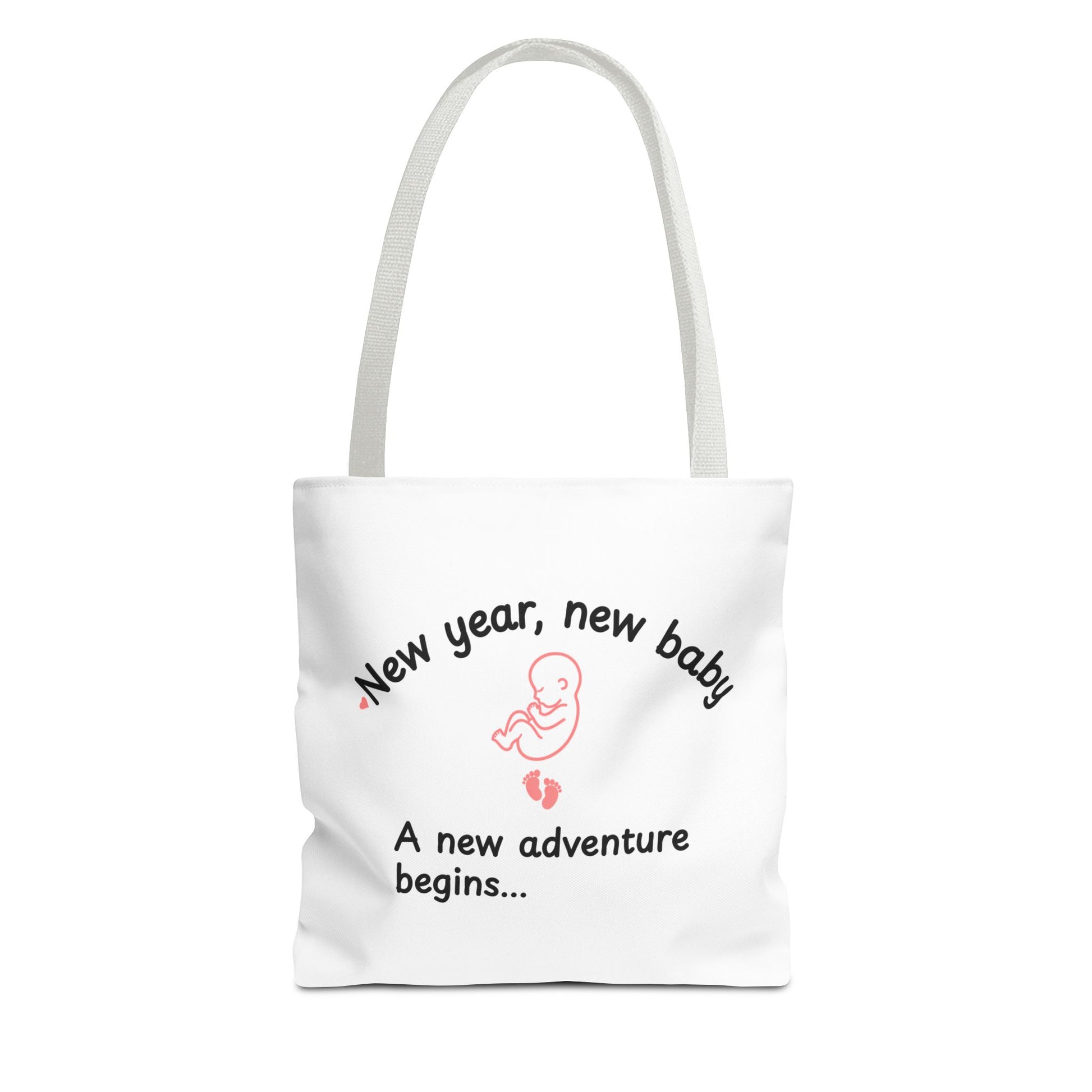 A white tote bag with white handle featuring the text 'New year, new baby. A new adventure begins...' on white background