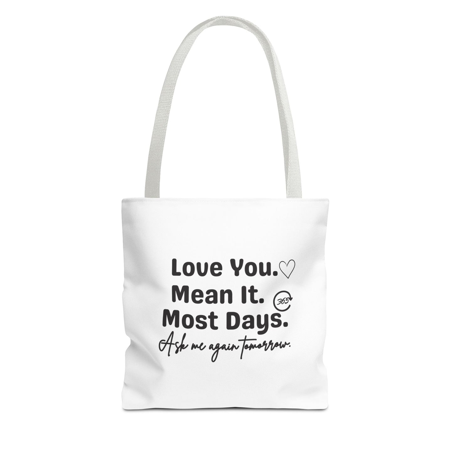 White tote bag with white handle and text 'Love You. Mean It. Most Days. Ask me again tomorrow.' on a white background