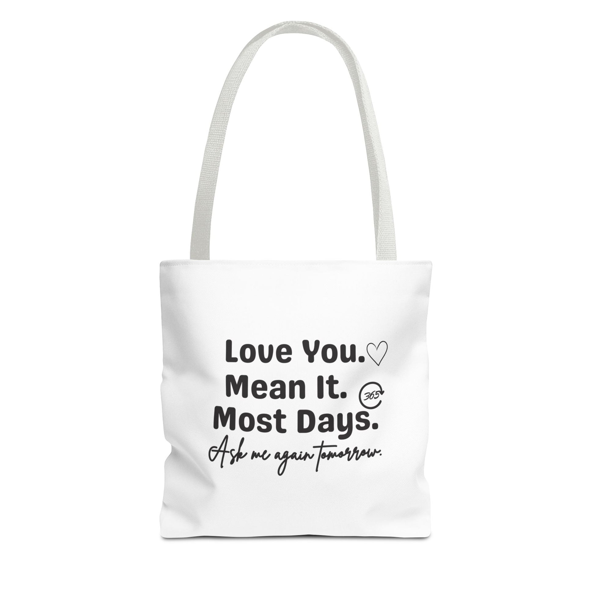 White tote bag with white handle and text 'Love You. Mean It. Most Days. Ask me again tomorrow.' on a white background