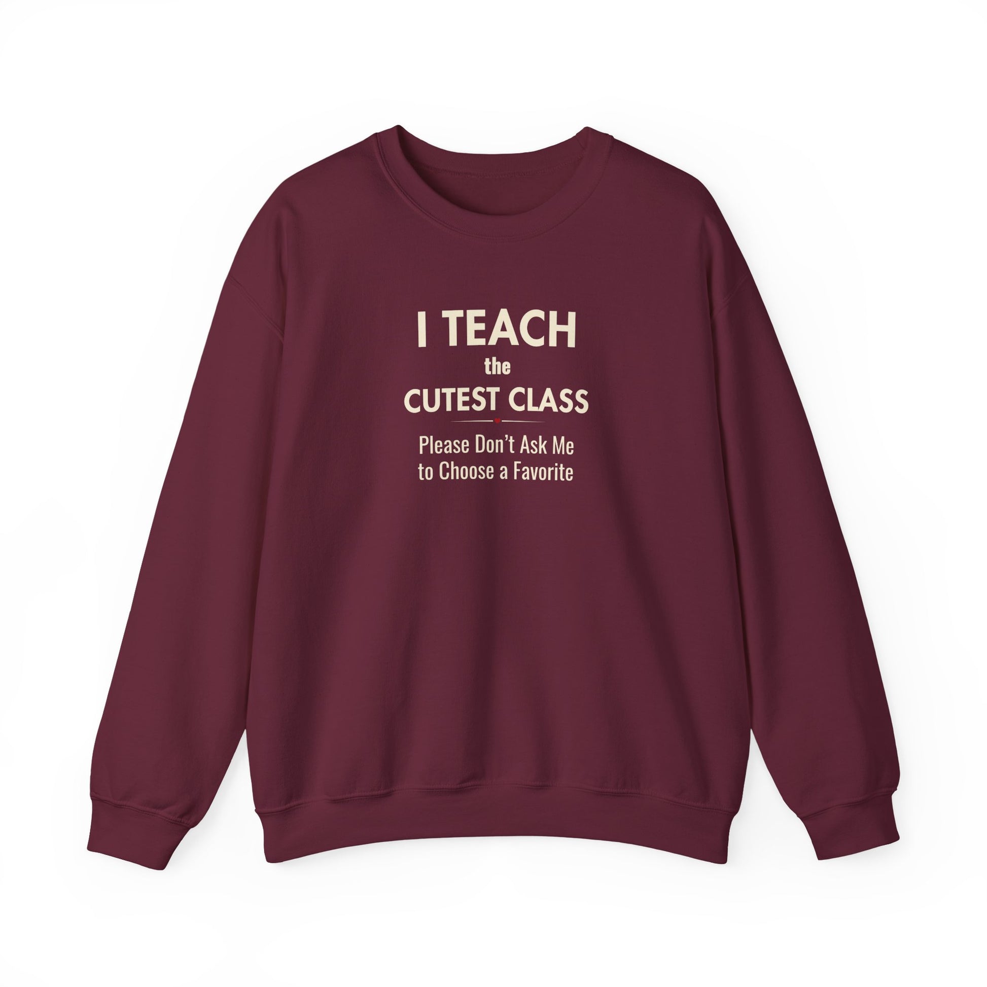 A maroon crewneck sweatshirt featuring the text 'I Teach the Cutest Class. Please Don’t Ask Me to Choose a Favorite', against a solid white background.