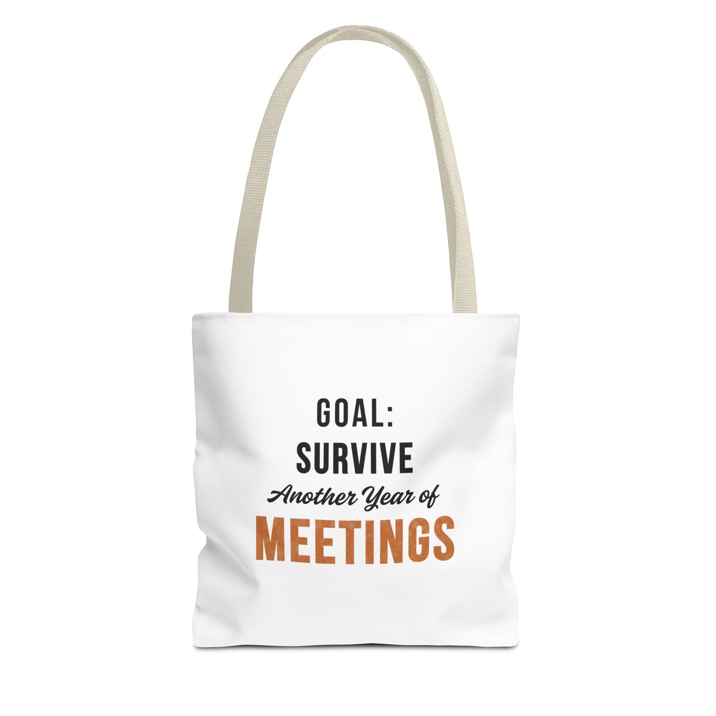 Tote bag with beige handles and text 'Goal: Survive Another Year of Meetings' on a white background
