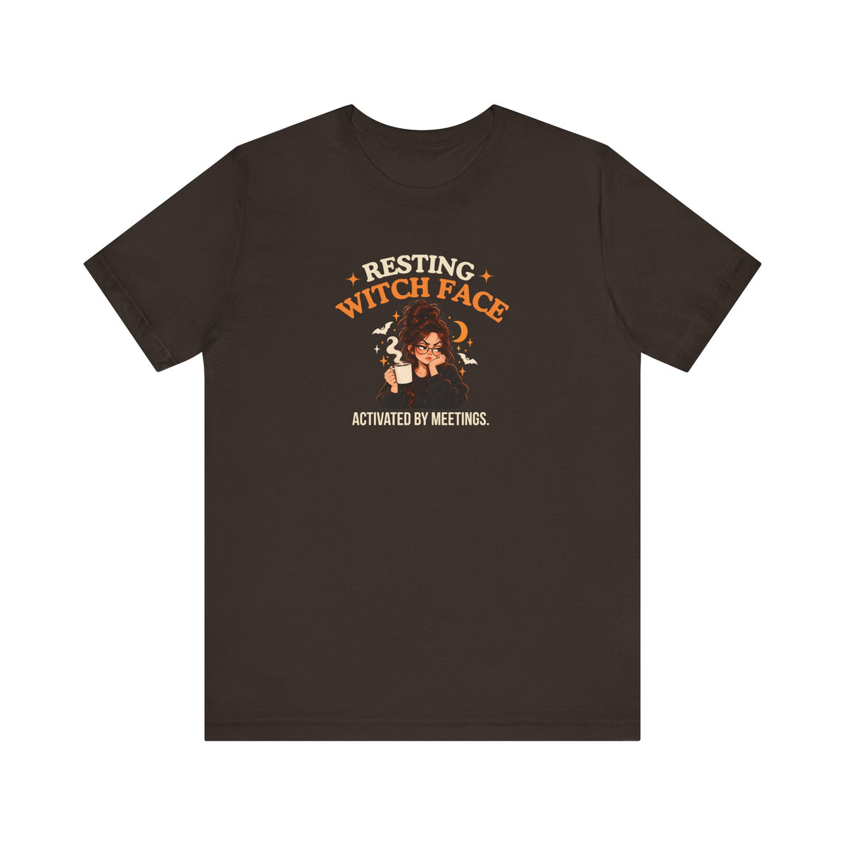 A brown t-shirt featuring the text 'Resting Witch Face. Activated by Meetings.' with a woman's face