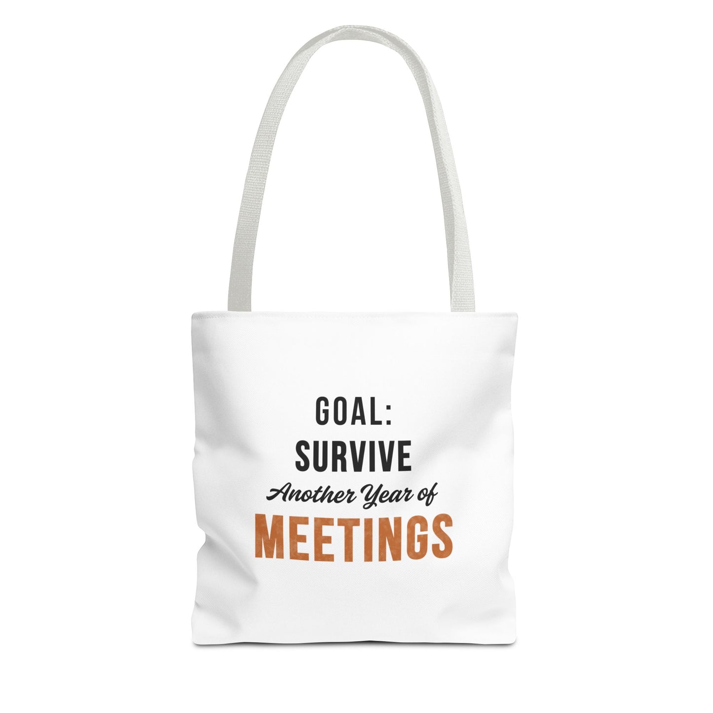 Tote bag with white handles and text 'Goal: Survive Another Year of Meetings' on a white background