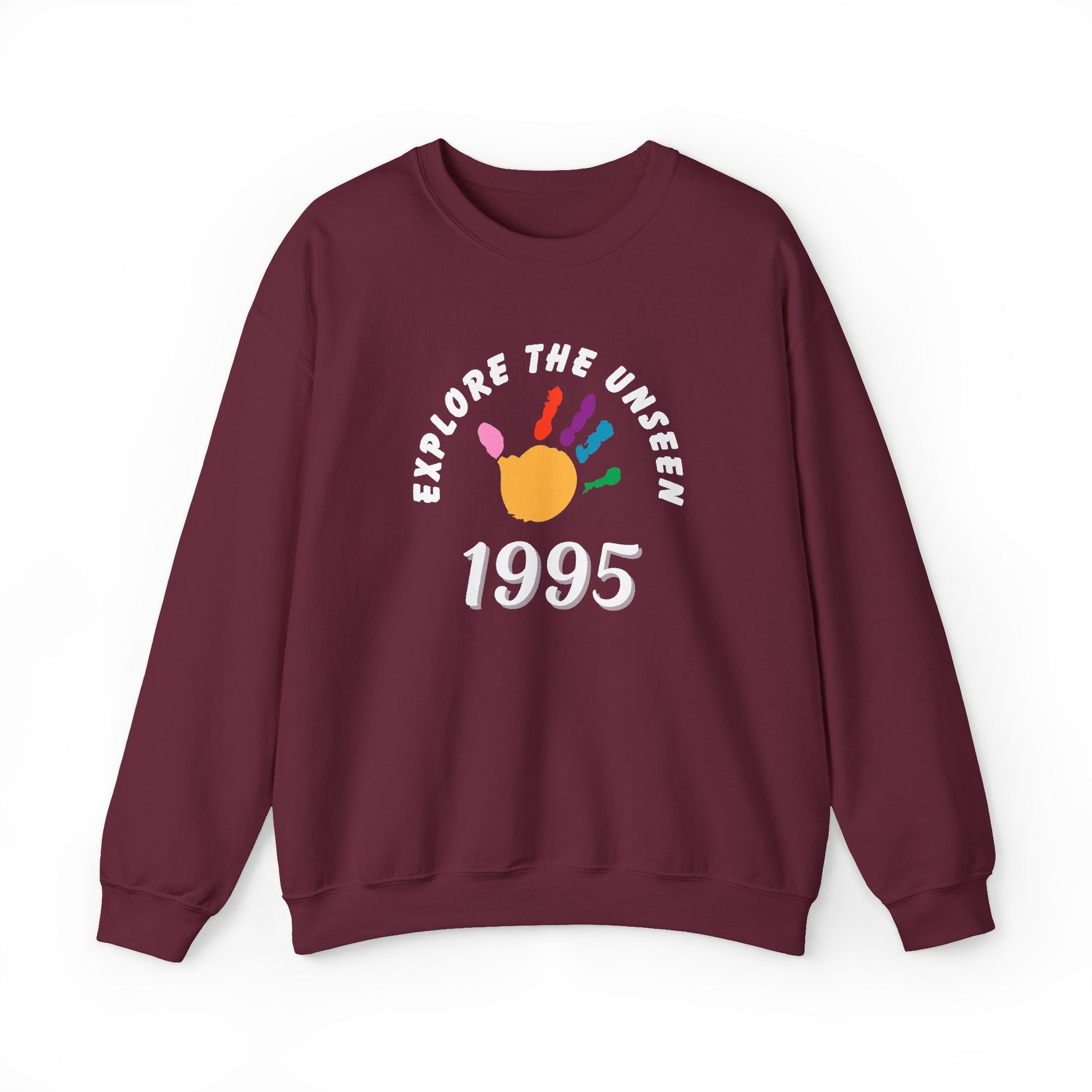 Maroon sweatshirt with 'Explore the Unseen 1995' graphic on a white background