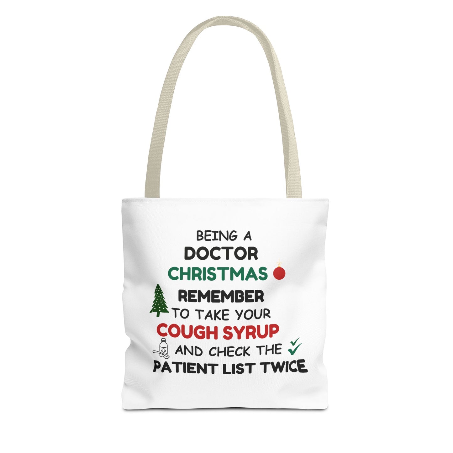 White tote bag with beige handle and  text 'Being a doctor during Christmas, remember to take your cough syrup and check the patient list twice' on a white background